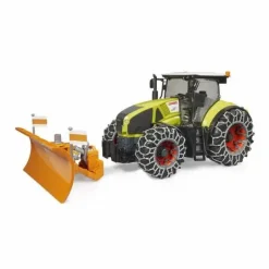 Claas Axion mit Schneeketten und Räumschild