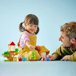 LEGO® DUPLO® Peppa Pig Peppas Garten mit Baumhaus